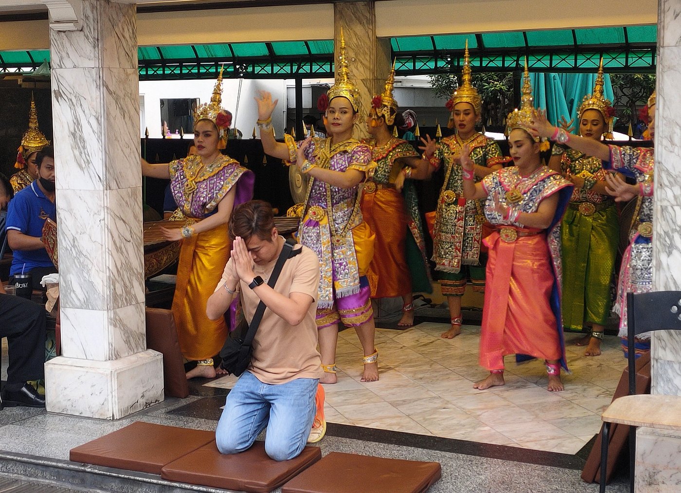 Thai folk dancers performing at Erawan shrine in Bangkok